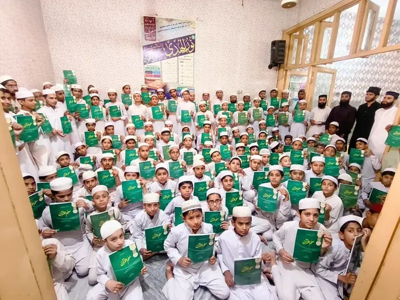 Students engaged in Qur’an study