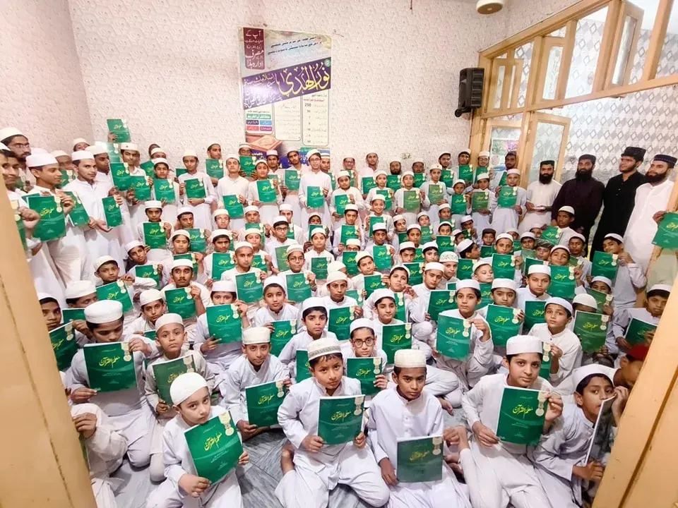 Students engaged in Qur’an study